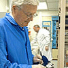 Photo of a senior working in a lab